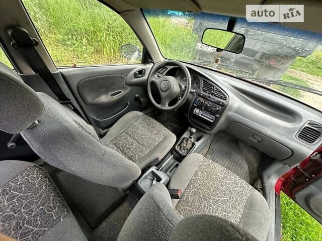 Красный Дэу Ланос, объемом двигателя 1.5 л и пробегом 150 тыс. км за 1250 $, фото 15 на Automoto.ua