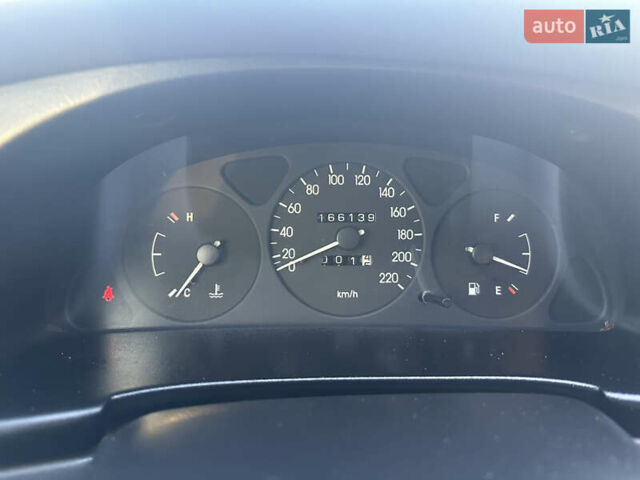 Красный Дэу Ланос, объемом двигателя 1.5 л и пробегом 166 тыс. км за 2999 $, фото 26 на Automoto.ua