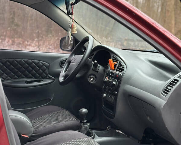 Красный Дэу Ланос, объемом двигателя 1.6 л и пробегом 235 тыс. км за 2150 $, фото 10 на Automoto.ua