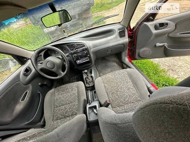 Красный Дэу Ланос, объемом двигателя 1.5 л и пробегом 150 тыс. км за 1250 $, фото 3 на Automoto.ua