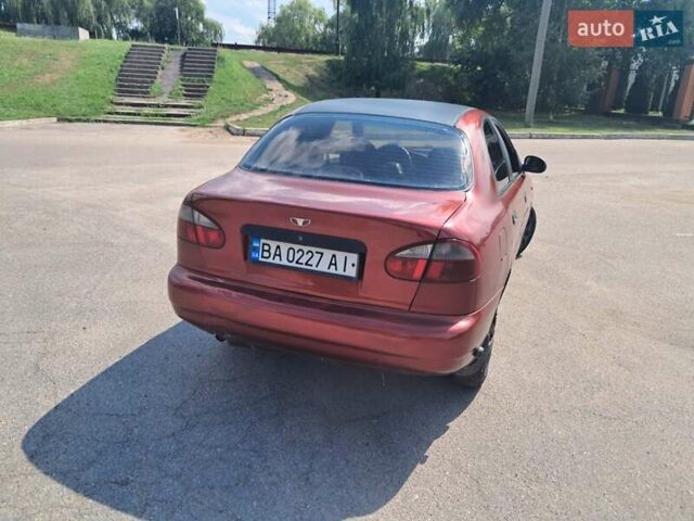 Красный Дэу Ланос, объемом двигателя 1.5 л и пробегом 270 тыс. км за 2100 $, фото 5 на Automoto.ua