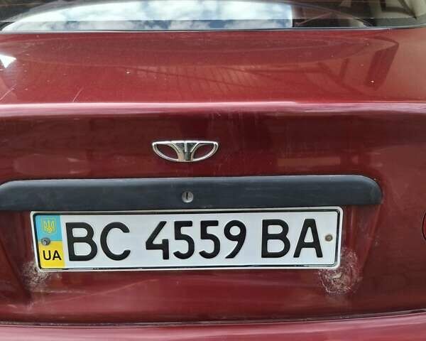 Красный Дэу Ланос, объемом двигателя 1.6 л и пробегом 187 тыс. км за 1800 $, фото 1 на Automoto.ua