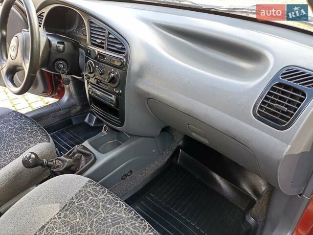 Красный Дэу Ланос, объемом двигателя 1.5 л и пробегом 174 тыс. км за 2650 $, фото 15 на Automoto.ua