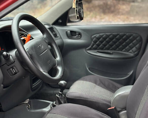 Красный Дэу Ланос, объемом двигателя 1.6 л и пробегом 235 тыс. км за 2150 $, фото 7 на Automoto.ua