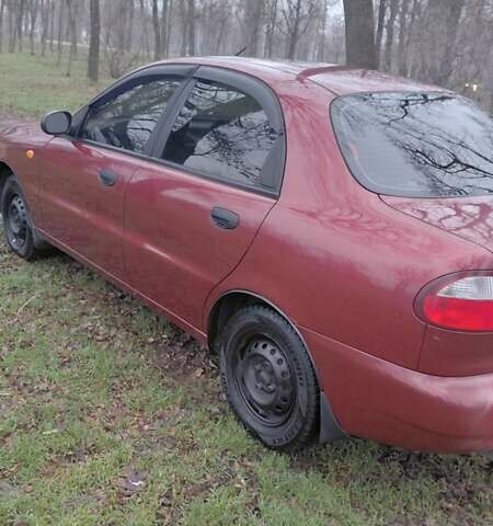 Красный Дэу Ланос, объемом двигателя 1.5 л и пробегом 230 тыс. км за 2600 $, фото 3 на Automoto.ua