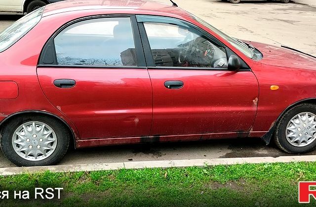Красный Дэу Ланос, объемом двигателя 1.5 л и пробегом 185 тыс. км за 1400 $, фото 6 на Automoto.ua