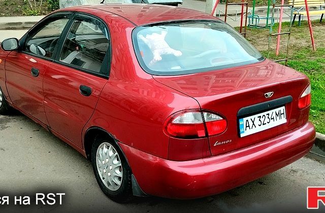 Красный Дэу Ланос, объемом двигателя 1.5 л и пробегом 185 тыс. км за 1400 $, фото 5 на Automoto.ua