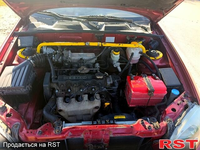 Червоний Деу Ланос, об'ємом двигуна 1.5 л та пробігом 313 тис. км за 2480 $, фото 2 на Automoto.ua