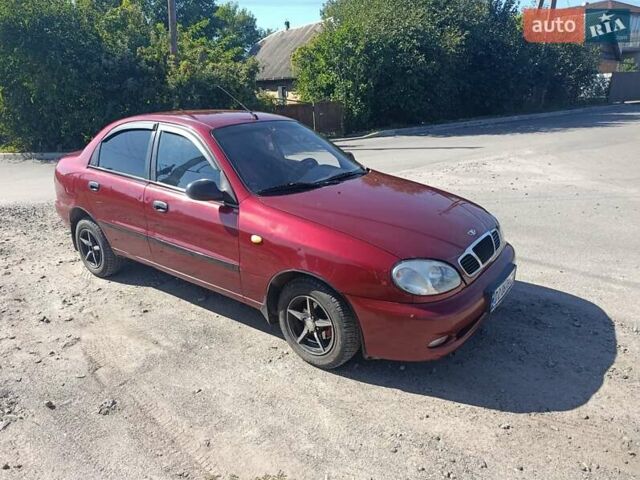 Красный Дэу Ланос, объемом двигателя 1.5 л и пробегом 330 тыс. км за 2550 $, фото 8 на Automoto.ua