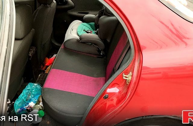 Красный Дэу Ланос, объемом двигателя 1.5 л и пробегом 185 тыс. км за 1400 $, фото 1 на Automoto.ua