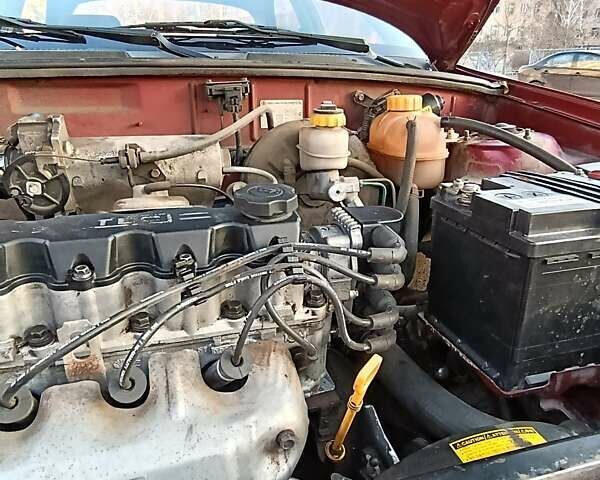 Красный Дэу Ланос, объемом двигателя 1.5 л и пробегом 103 тыс. км за 3000 $, фото 3 на Automoto.ua