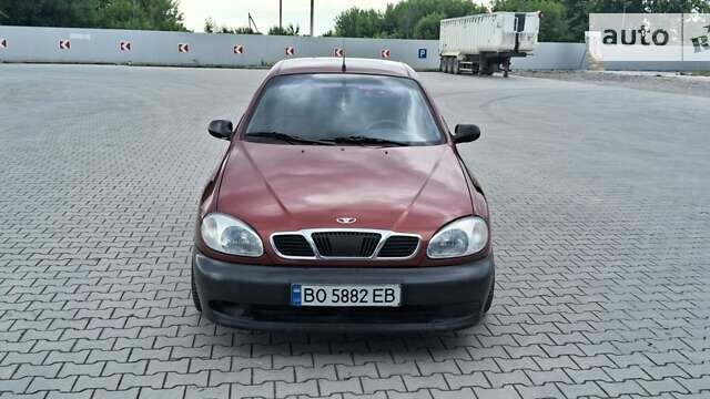 Красный Дэу Ланос, объемом двигателя 1.5 л и пробегом 150 тыс. км за 1250 $, фото 1 на Automoto.ua