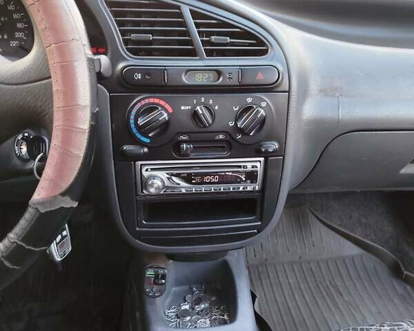 Червоний Деу Ланос, об'ємом двигуна 1.5 л та пробігом 102 тис. км за 2350 $, фото 9 на Automoto.ua