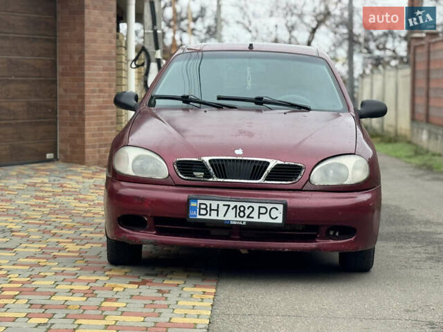 Красный Дэу Ланос, объемом двигателя 1.5 л и пробегом 270 тыс. км за 1400 $, фото 1 на Automoto.ua