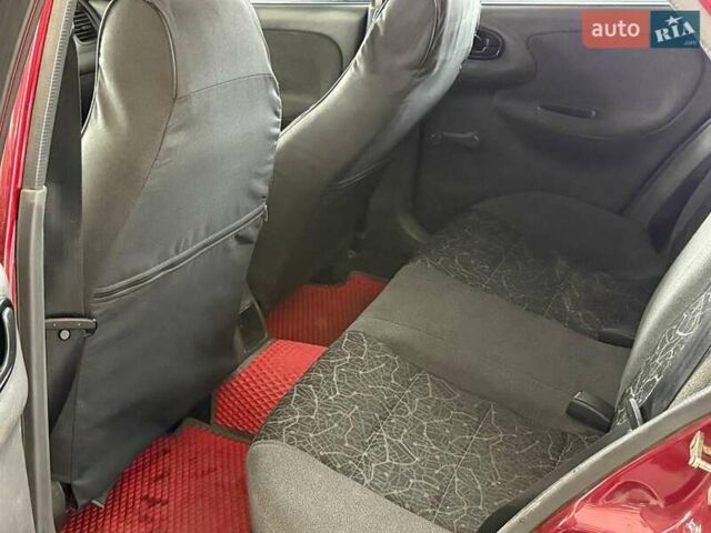 Червоний Деу Ланос, об'ємом двигуна 1.5 л та пробігом 305 тис. км за 2440 $, фото 9 на Automoto.ua