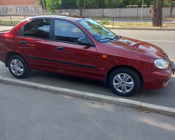 Красный Дэу Ланос, объемом двигателя 1.5 л и пробегом 123 тыс. км за 3100 $, фото 1 на Automoto.ua
