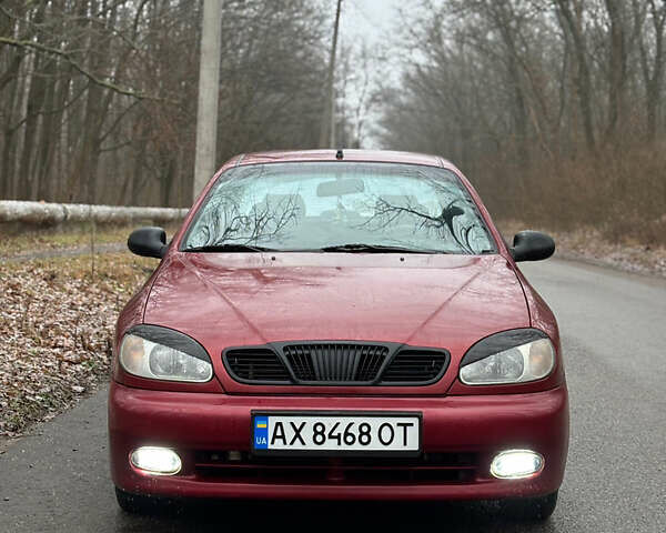 Красный Дэу Ланос, объемом двигателя 1.6 л и пробегом 235 тыс. км за 2150 $, фото 1 на Automoto.ua