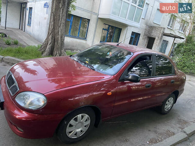Красный Дэу Ланос, объемом двигателя 1.5 л и пробегом 240 тыс. км за 2600 $, фото 1 на Automoto.ua