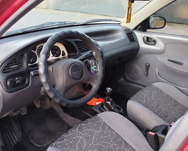 Червоний Деу Ланос, об'ємом двигуна 1.5 л та пробігом 150 тис. км за 2800 $, фото 14 на Automoto.ua