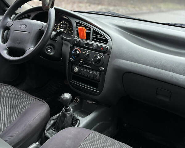 Красный Дэу Ланос, объемом двигателя 1.6 л и пробегом 235 тыс. км за 2150 $, фото 11 на Automoto.ua