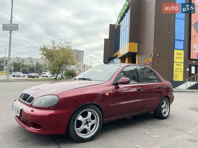 Красный Дэу Ланос, объемом двигателя 1.5 л и пробегом 400 тыс. км за 2300 $, фото 11 на Automoto.ua