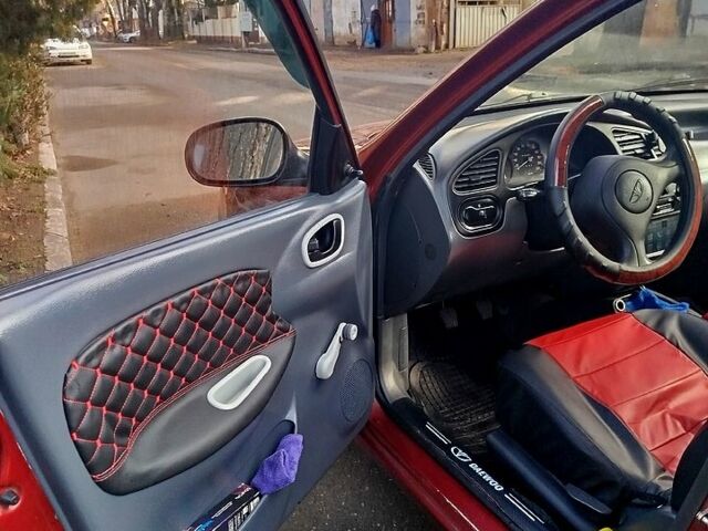 Красный Дэу Ланос, объемом двигателя 1.5 л и пробегом 243 тыс. км за 2650 $, фото 6 на Automoto.ua