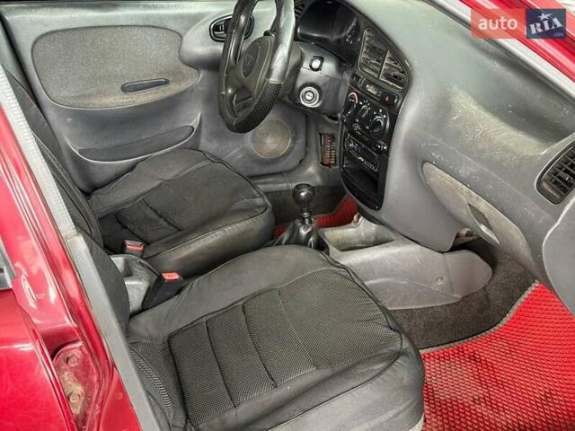 Червоний Деу Ланос, об'ємом двигуна 1.5 л та пробігом 305 тис. км за 2440 $, фото 11 на Automoto.ua