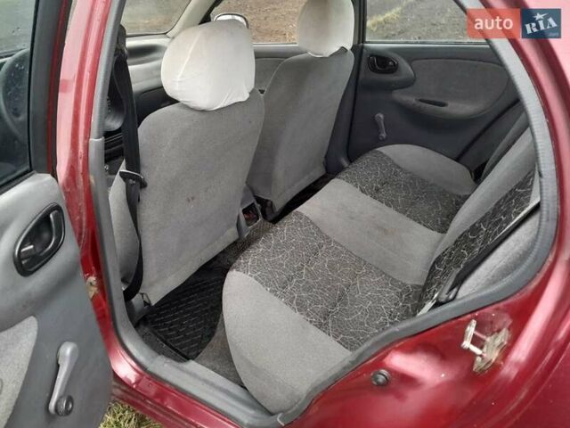 Красный Дэу Ланос, объемом двигателя 1.5 л и пробегом 163 тыс. км за 2200 $, фото 4 на Automoto.ua