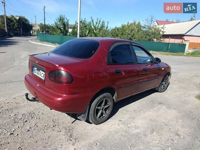 Красный Дэу Ланос, объемом двигателя 1.5 л и пробегом 330 тыс. км за 2550 $, фото 9 на Automoto.ua