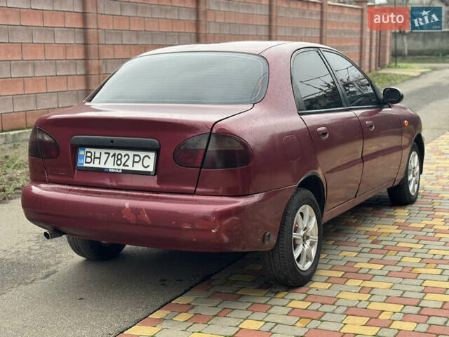 Красный Дэу Ланос, объемом двигателя 1.5 л и пробегом 270 тыс. км за 1400 $, фото 5 на Automoto.ua