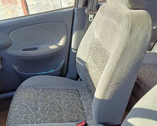 Червоний Деу Ланос, об'ємом двигуна 1.5 л та пробігом 268 тис. км за 1950 $, фото 26 на Automoto.ua