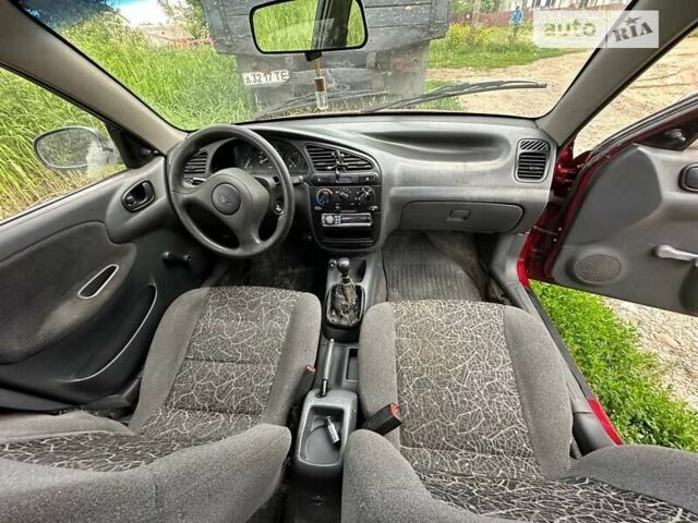 Красный Дэу Ланос, объемом двигателя 1.5 л и пробегом 150 тыс. км за 1250 $, фото 6 на Automoto.ua
