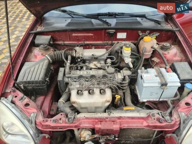 Червоний Деу Ланос, об'ємом двигуна 1.5 л та пробігом 224 тис. км за 1400 $, фото 12 на Automoto.ua