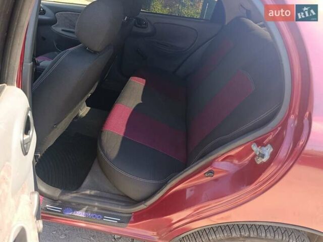 Красный Дэу Ланос, объемом двигателя 1.5 л и пробегом 330 тыс. км за 2550 $, фото 12 на Automoto.ua