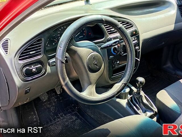 Червоний Деу Ланос, об'ємом двигуна 1.5 л та пробігом 350 тис. км за 1200 $, фото 3 на Automoto.ua