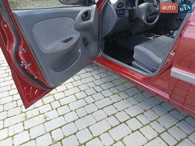 Красный Дэу Ланос, объемом двигателя 1.5 л и пробегом 174 тыс. км за 2650 $, фото 10 на Automoto.ua