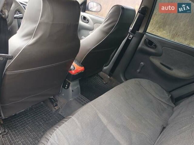 Красный Дэу Ланос, объемом двигателя 1.5 л и пробегом 289 тыс. км за 1700 $, фото 6 на Automoto.ua