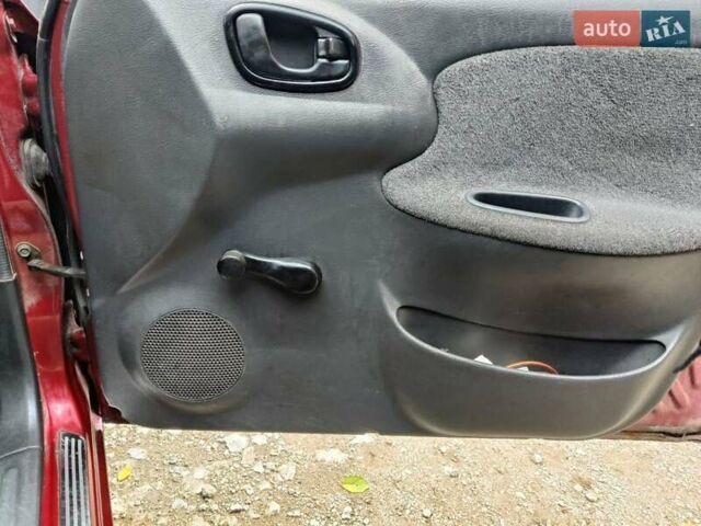 Красный Дэу Ланос, объемом двигателя 1.5 л и пробегом 275 тыс. км за 1700 $, фото 8 на Automoto.ua