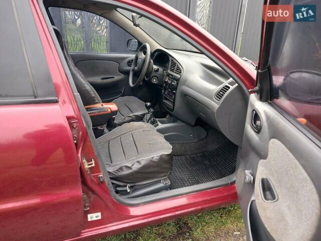 Красный Дэу Ланос, объемом двигателя 1.5 л и пробегом 289 тыс. км за 1700 $, фото 7 на Automoto.ua