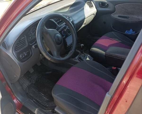 Красный Дэу Ланос, объемом двигателя 1.5 л и пробегом 330 тыс. км за 2550 $, фото 11 на Automoto.ua