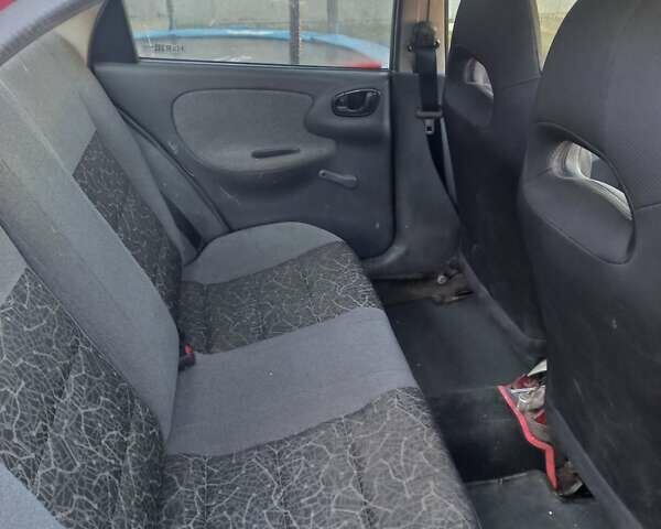 Красный Дэу Ланос, объемом двигателя 1.5 л и пробегом 400 тыс. км за 2300 $, фото 4 на Automoto.ua