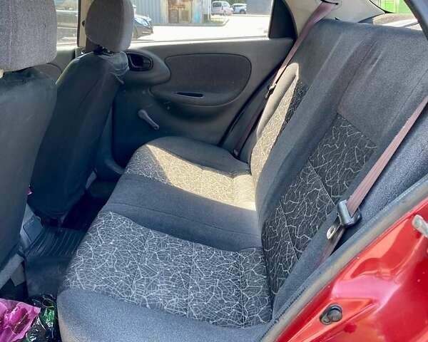 Красный Дэу Ланос, объемом двигателя 1.5 л и пробегом 150 тыс. км за 2600 $, фото 18 на Automoto.ua