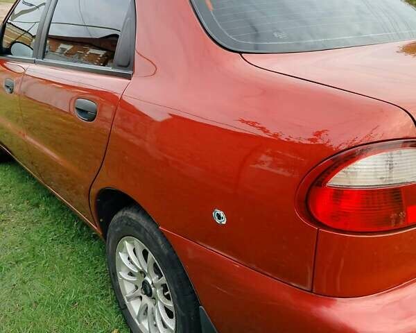 Деу Ланос 2008 у Богодухове на Automoto.ua Червоний Деу Ланос, об'ємом двигуна 1.5 л та пробігом 153 тис. км за 2600 $, фото 6 на Automoto.ua