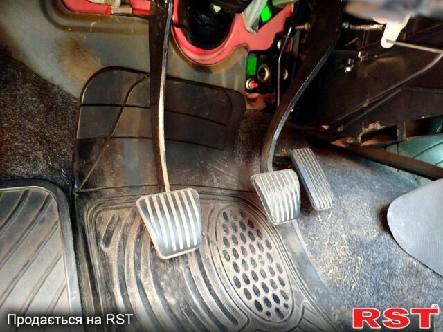 Красный Дэу Ланос, объемом двигателя 1.5 л и пробегом 158 тыс. км за 3500 $, фото 9 на Automoto.ua