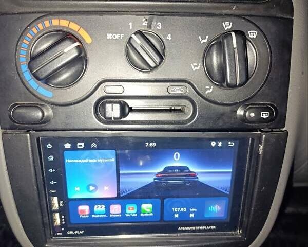 Красный Дэу Ланос, объемом двигателя 1.5 л и пробегом 257 тыс. км за 2000 $, фото 6 на Automoto.ua