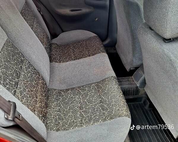 Красный Дэу Ланос, объемом двигателя 1.5 л и пробегом 113 тыс. км за 2500 $, фото 15 на Automoto.ua