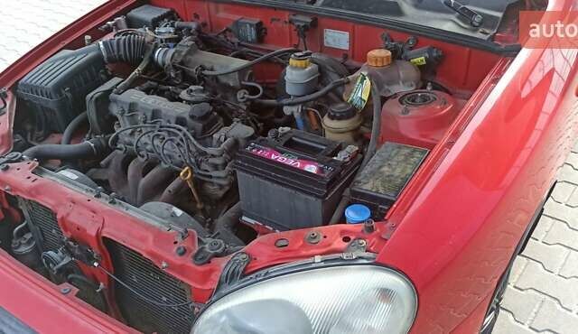 Красный Дэу Ланос, объемом двигателя 1.5 л и пробегом 437 тыс. км за 2150 $, фото 14 на Automoto.ua