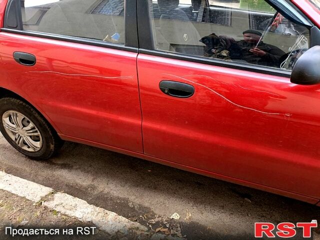 Червоний Деу Ланос, об'ємом двигуна 1.4 л та пробігом 81 тис. км за 2500 $, фото 6 на Automoto.ua