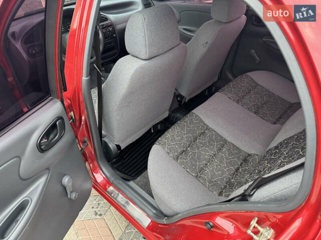 Красный Дэу Ланос, объемом двигателя 1.4 л и пробегом 44 тыс. км за 3700 $, фото 11 на Automoto.ua