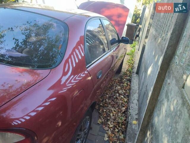 Красный Дэу Ланос, объемом двигателя 1.5 л и пробегом 278 тыс. км за 2500 $, фото 5 на Automoto.ua